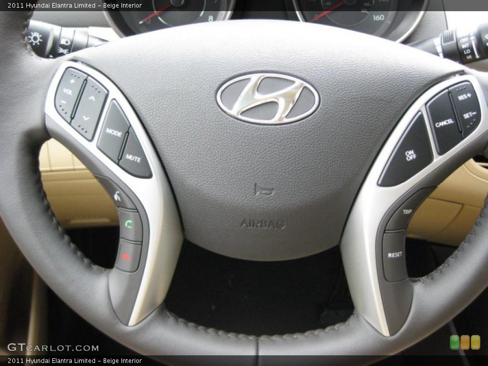 Beige Interior Controls for the 2011 Hyundai Elantra Limited #42321745