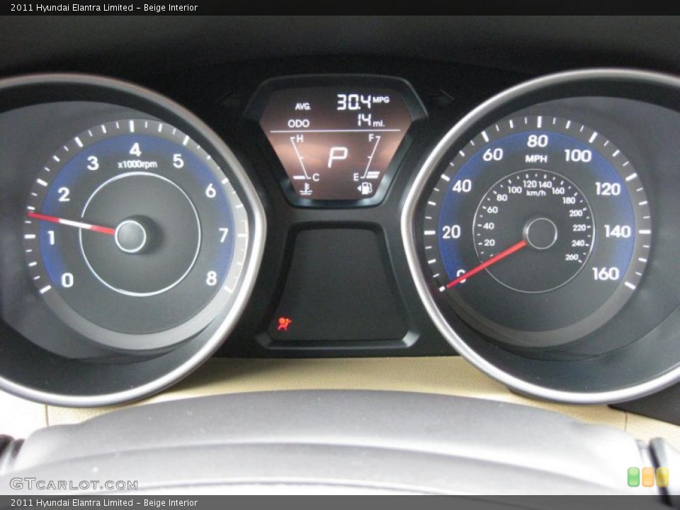Beige Interior Gauges for the 2011 Hyundai Elantra Limited #42321763