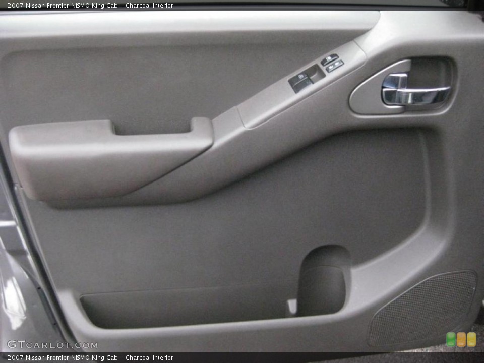 Charcoal Interior Door Panel for the 2007 Nissan Frontier NISMO King Cab #42324687