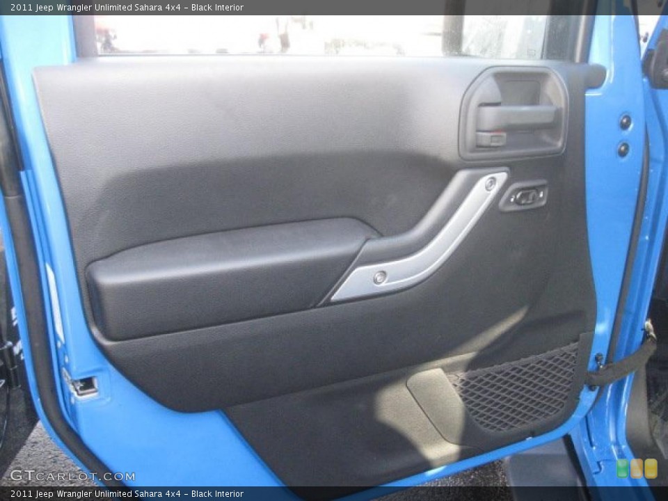 Black Interior Door Panel for the 2011 Jeep Wrangler Unlimited Sahara 4x4 #42334423