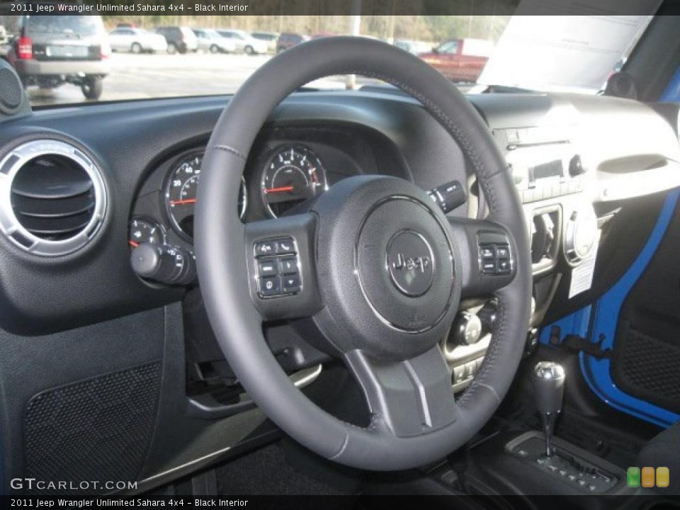 Black Interior Steering Wheel for the 2011 Jeep Wrangler Unlimited Sahara 4x4 #42334483