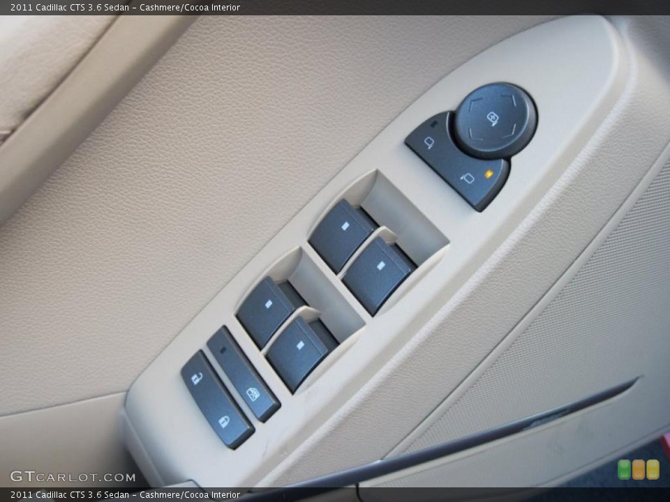Cashmere/Cocoa Interior Controls for the 2011 Cadillac CTS 3.6 Sedan #42337519