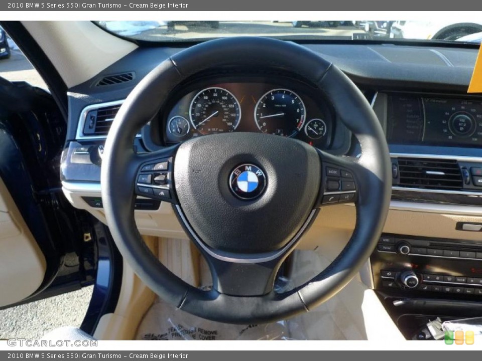 Cream Beige Interior Steering Wheel for the 2010 BMW 5 Series 550i Gran Turismo #42357409