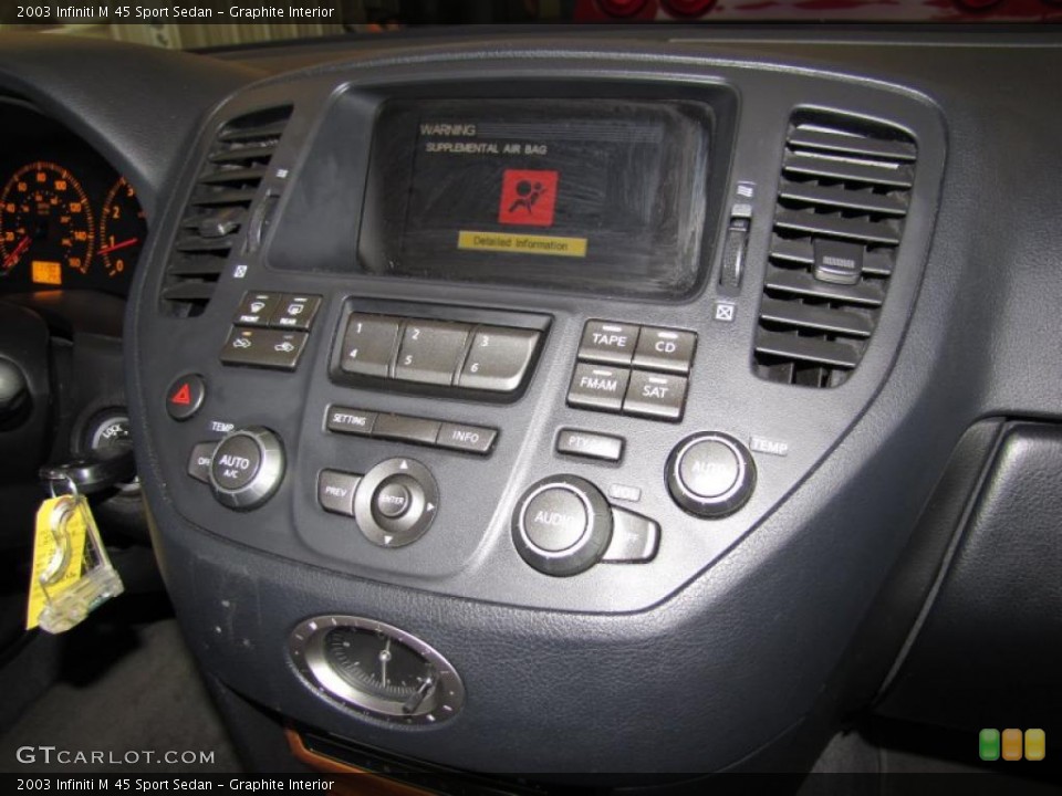 Graphite Interior Controls for the 2003 Infiniti M 45 Sport Sedan #42366797
