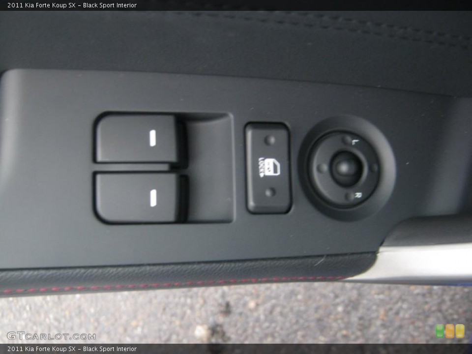 Black Sport Interior Controls for the 2011 Kia Forte Koup SX #42392301