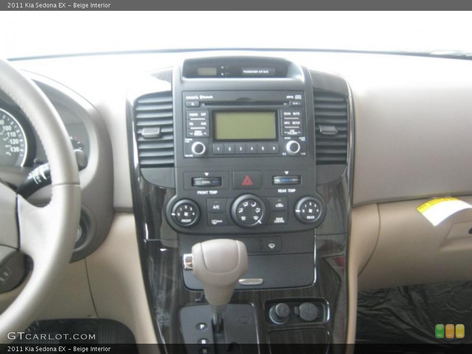 Beige Interior Controls for the 2011 Kia Sedona EX #42393375
