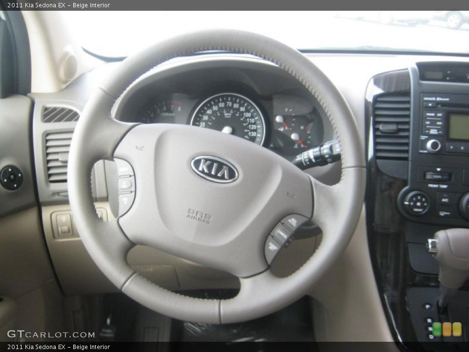 Beige Interior Steering Wheel for the 2011 Kia Sedona EX #42393391