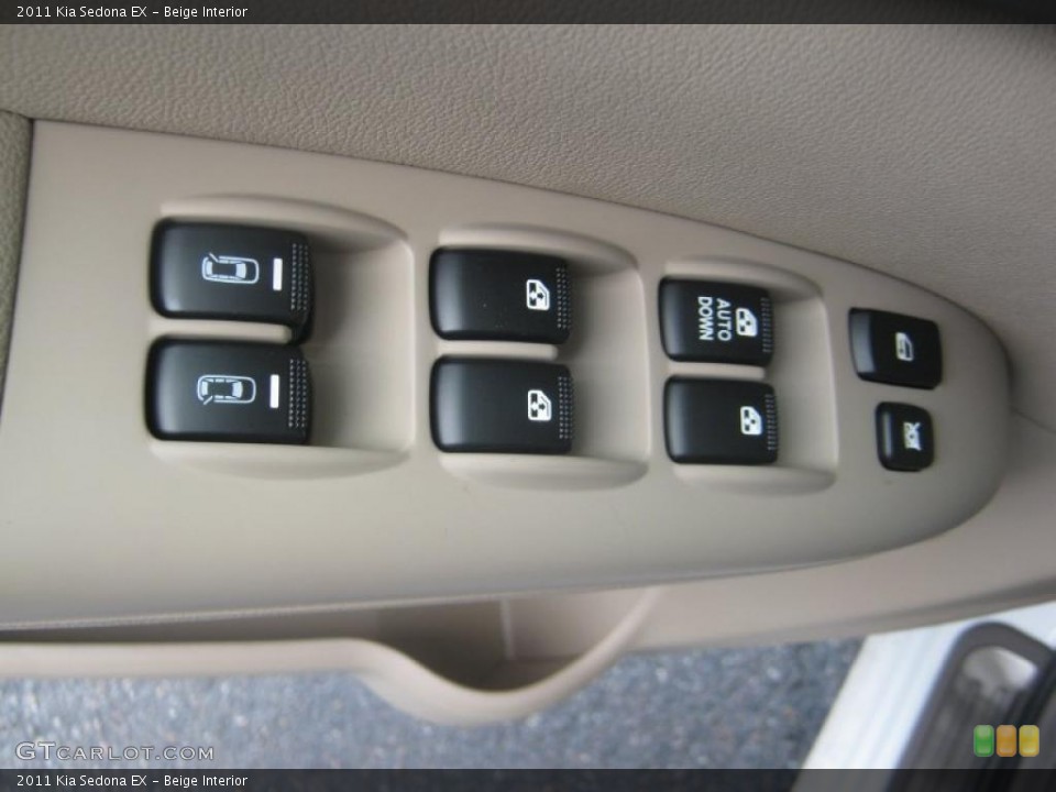 Beige Interior Controls for the 2011 Kia Sedona EX #42393495