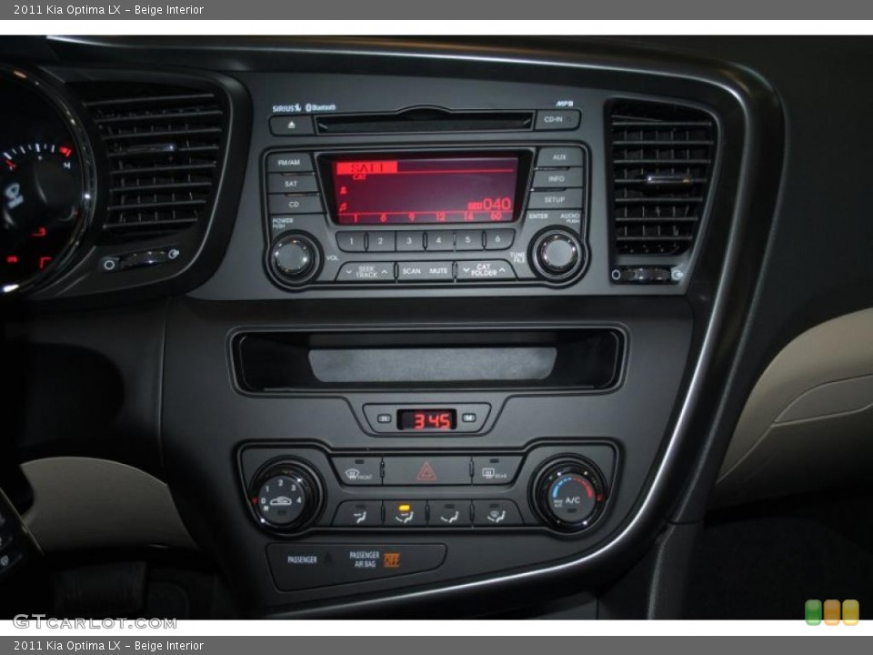Beige Interior Controls for the 2011 Kia Optima LX #42398208
