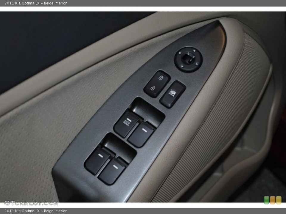 Beige Interior Controls for the 2011 Kia Optima LX #42398319