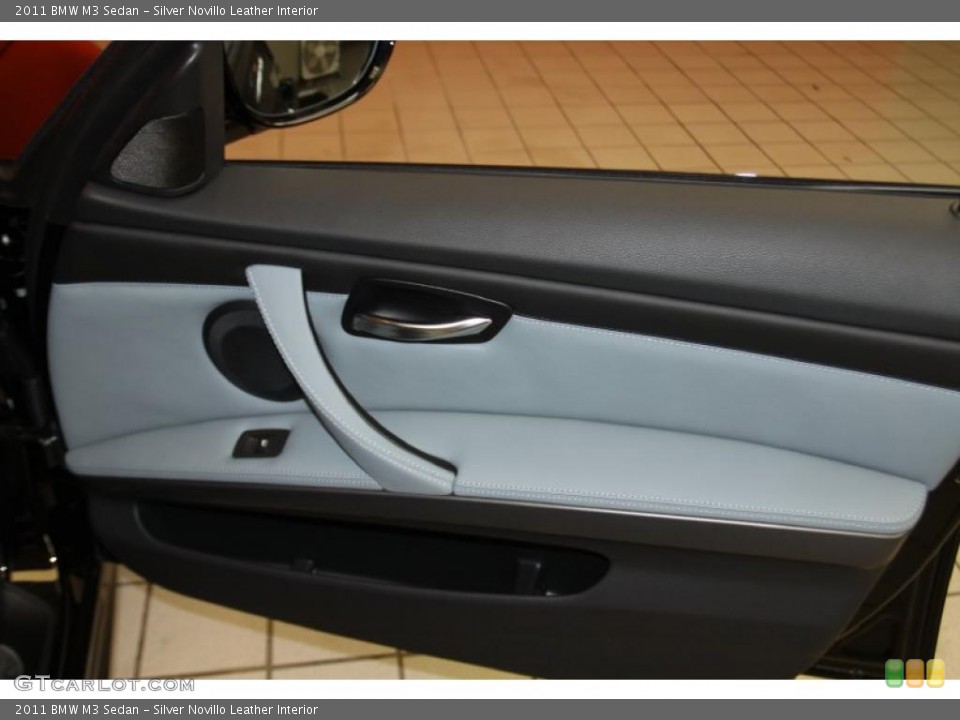 Silver Novillo Leather Interior Door Panel for the 2011 BMW M3 Sedan #42399427