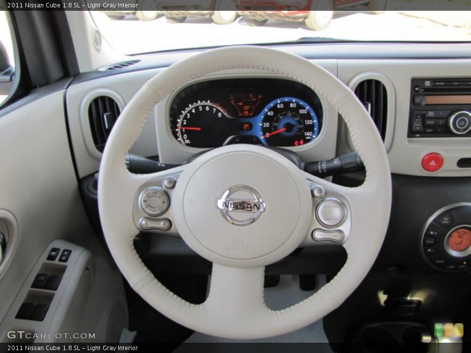 Light Gray Interior Steering Wheel for the 2011 Nissan Cube 1.8 SL #42438564