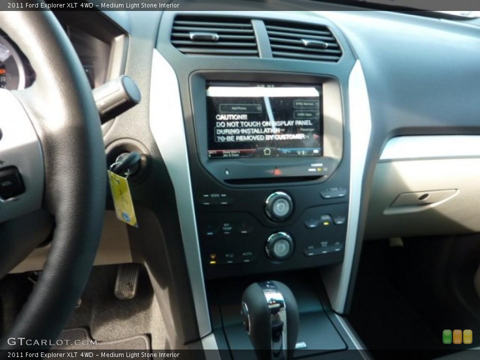 Medium Light Stone Interior Controls for the 2011 Ford Explorer XLT 4WD #42448375