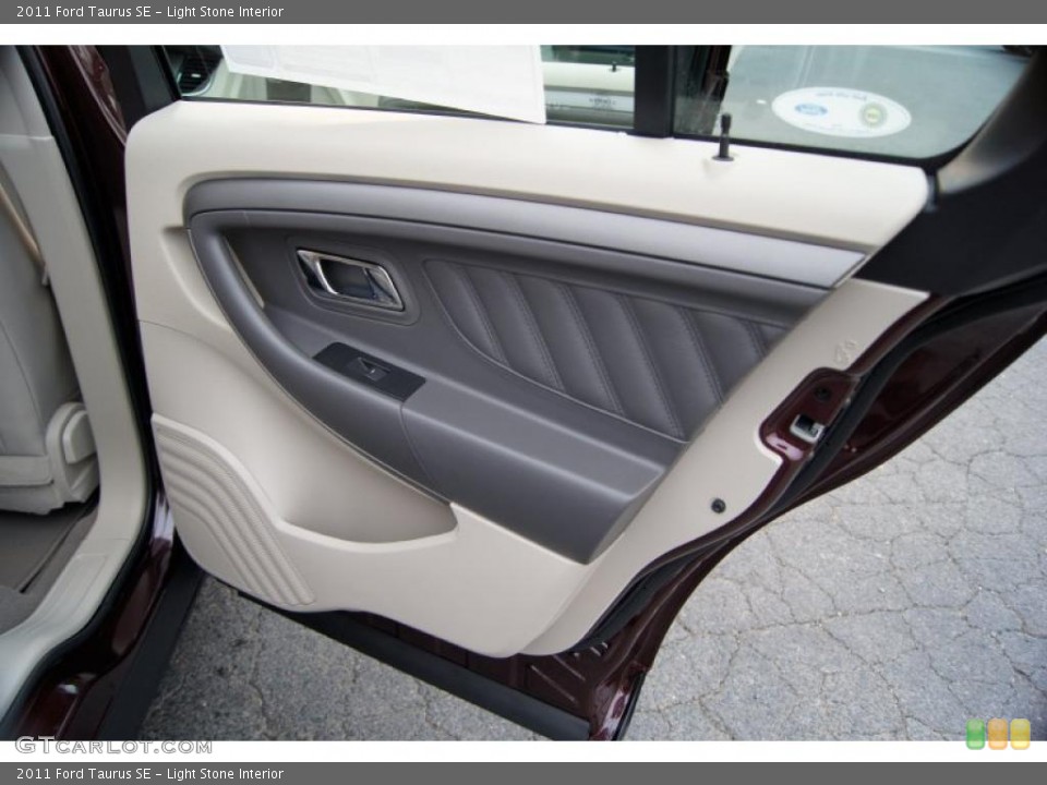 Light Stone Interior Door Panel for the 2011 Ford Taurus SE #42461735