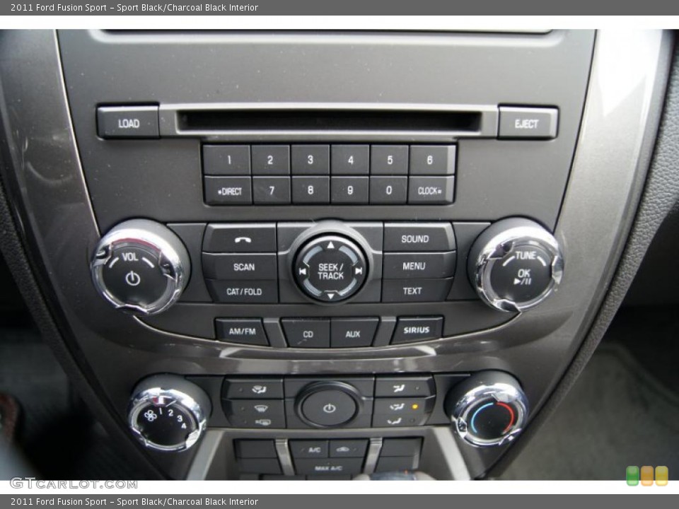 Sport Black/Charcoal Black Interior Controls for the 2011 Ford Fusion Sport #42463107