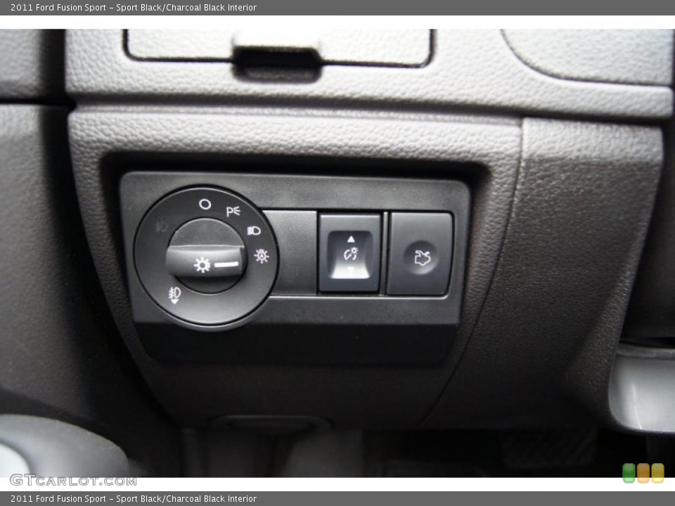 Sport Black/Charcoal Black Interior Controls for the 2011 Ford Fusion Sport #42463199