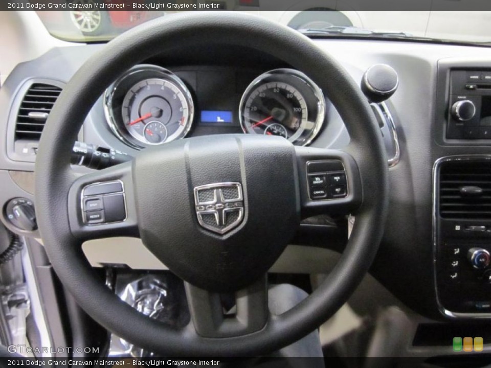 Black/Light Graystone Interior Steering Wheel for the 2011 Dodge Grand Caravan Mainstreet #42465403