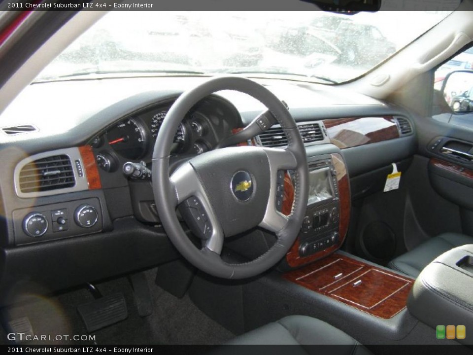 Ebony 2011 Chevrolet Suburban Interiors