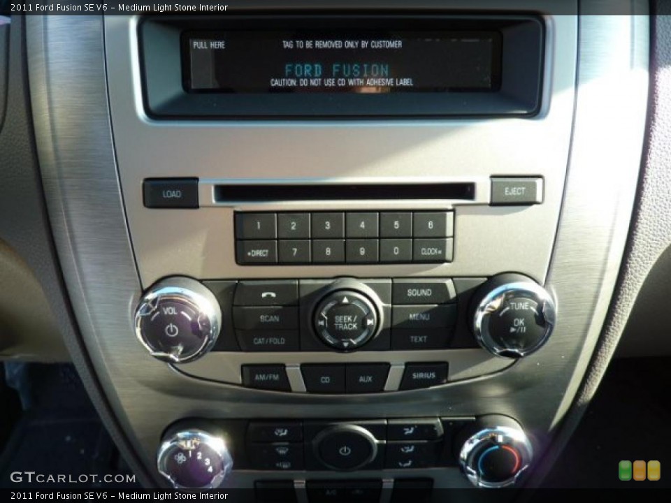 Medium Light Stone Interior Controls for the 2011 Ford Fusion SE V6 #42511631