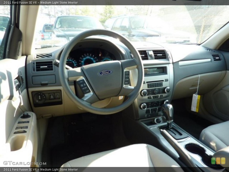 Medium Light Stone Interior Dashboard for the 2011 Ford Fusion SE V6 #42511803