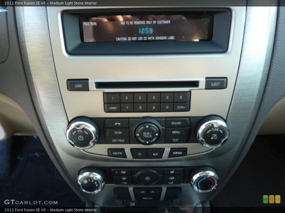 Medium Light Stone Interior Controls for the 2011 Ford Fusion SE V6 #42511835