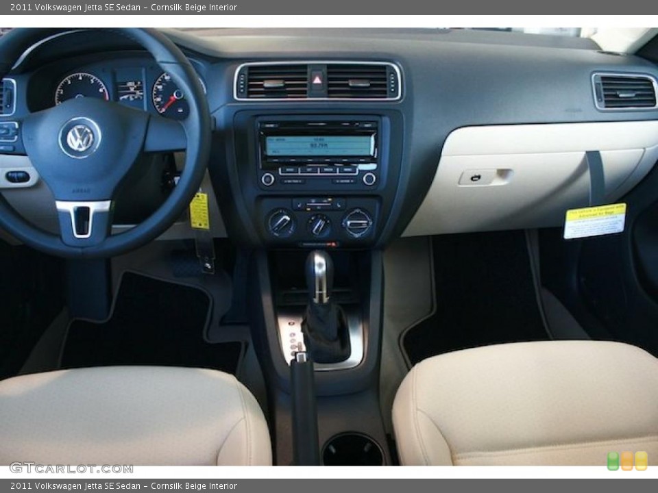 Cornsilk Beige Interior Dashboard for the 2011 Volkswagen Jetta SE Sedan #42514939