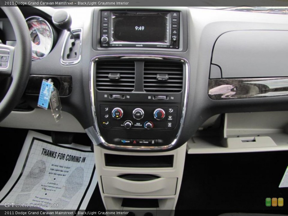 Black/Light Graystone Interior Controls for the 2011 Dodge Grand Caravan Mainstreet #42533425