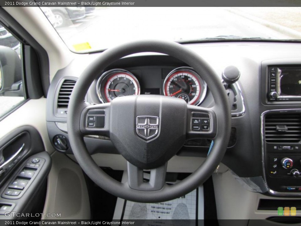 Black/Light Graystone Interior Steering Wheel for the 2011 Dodge Grand Caravan Mainstreet #42533433
