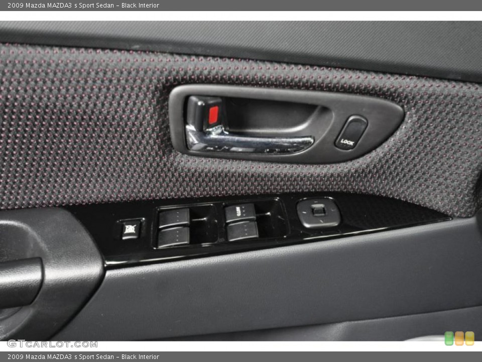 Black Interior Controls for the 2009 Mazda MAZDA3 s Sport Sedan #42579186