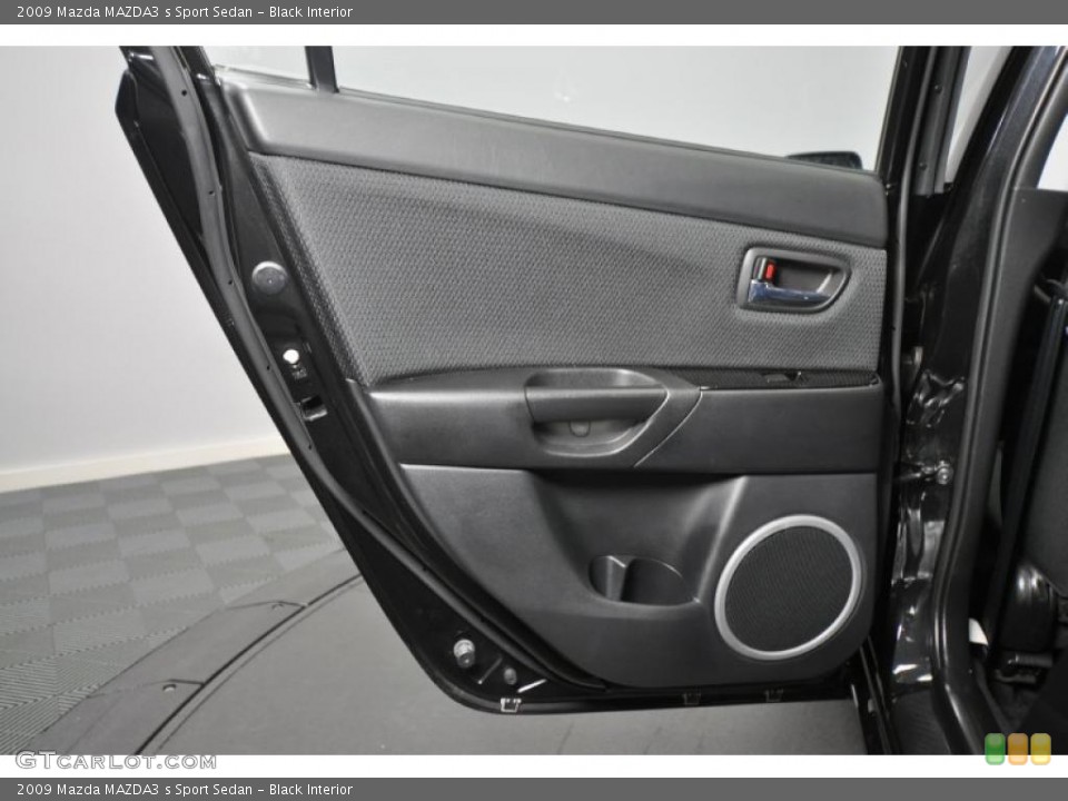 Black Interior Door Panel for the 2009 Mazda MAZDA3 s Sport Sedan #42579238