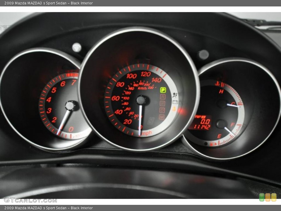 Black Interior Gauges for the 2009 Mazda MAZDA3 s Sport Sedan #42579554