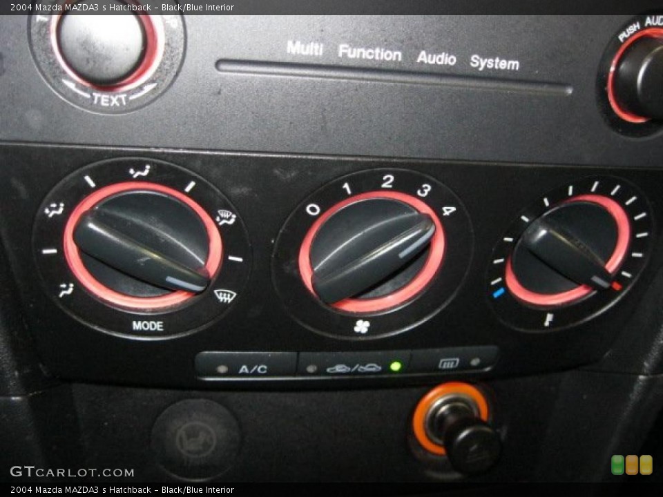 Black/Blue Interior Controls for the 2004 Mazda MAZDA3 s Hatchback #42612780