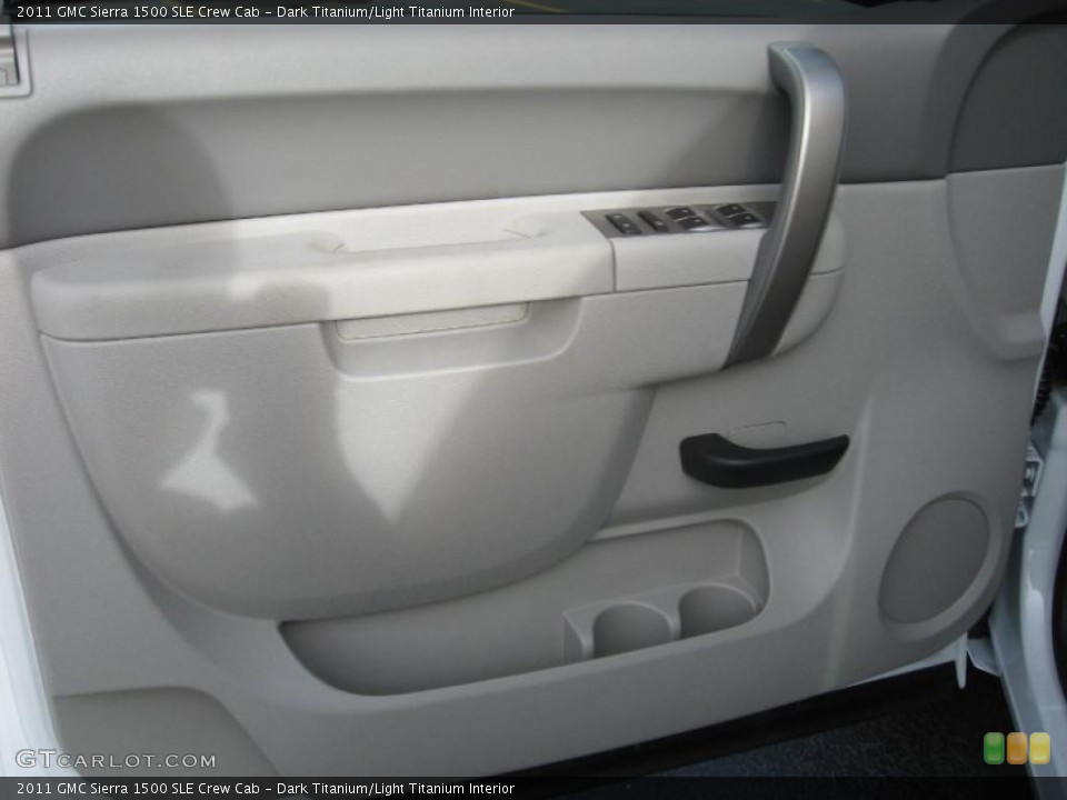 Dark Titanium/Light Titanium Interior Door Panel for the 2011 GMC Sierra 1500 SLE Crew Cab #42628028