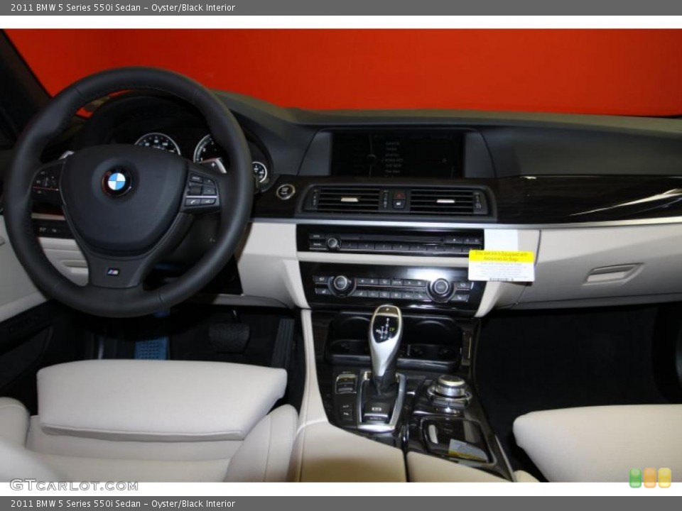 Oyster/Black Interior Dashboard for the 2011 BMW 5 Series 550i Sedan #42634496