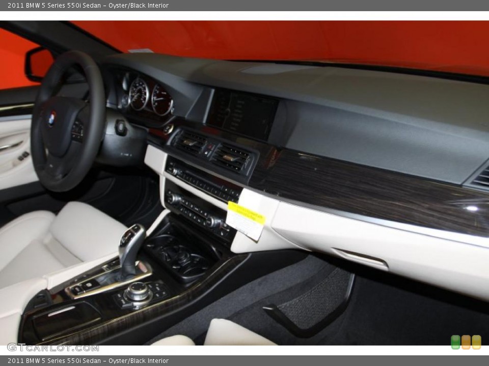 Oyster/Black Interior Dashboard for the 2011 BMW 5 Series 550i Sedan #42634588