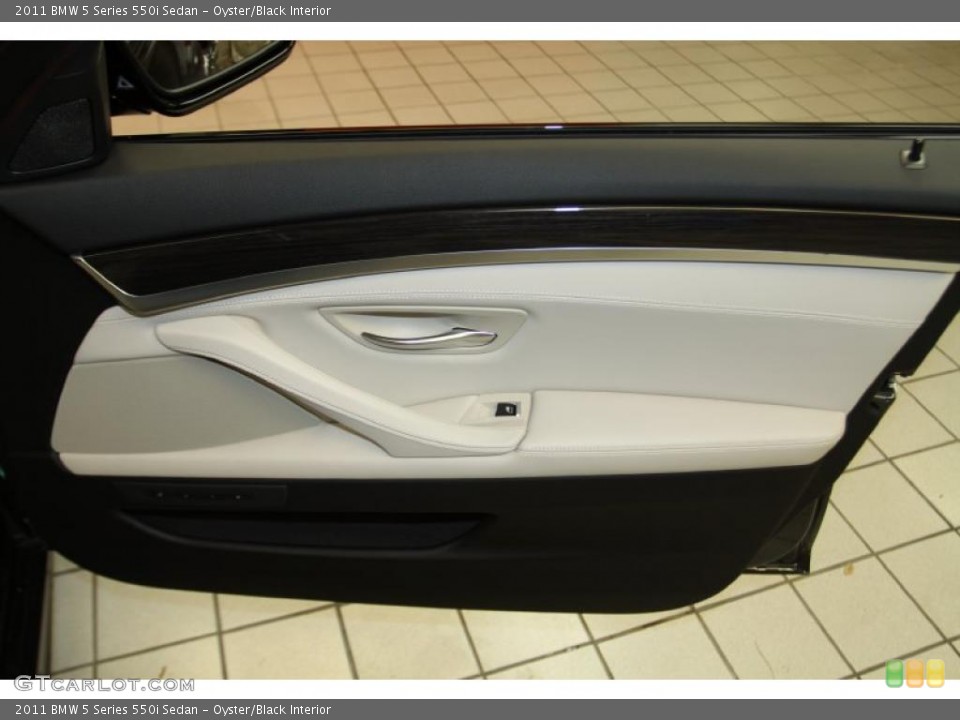 Oyster/Black Interior Door Panel for the 2011 BMW 5 Series 550i Sedan #42634600