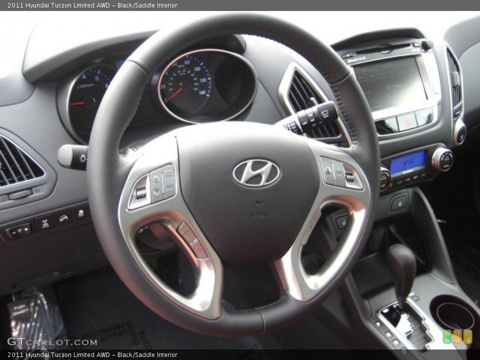 Black/Saddle Interior Steering Wheel for the 2011 Hyundai Tucson Limited AWD #42648308