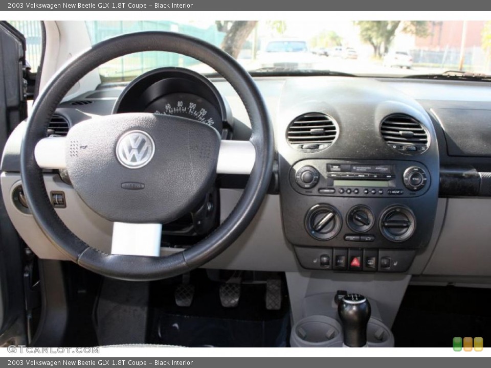 Black Interior Dashboard for the 2003 Volkswagen New Beetle GLX 1.8T Coupe #42648384
