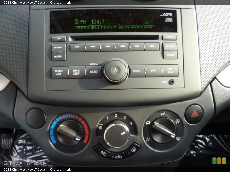Charcoal Interior Controls for the 2011 Chevrolet Aveo LT Sedan #42720578
