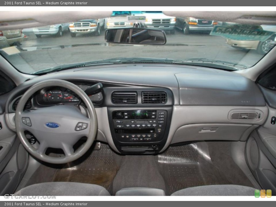 Medium Graphite Interior Dashboard for the 2001 Ford Taurus SEL #42728939
