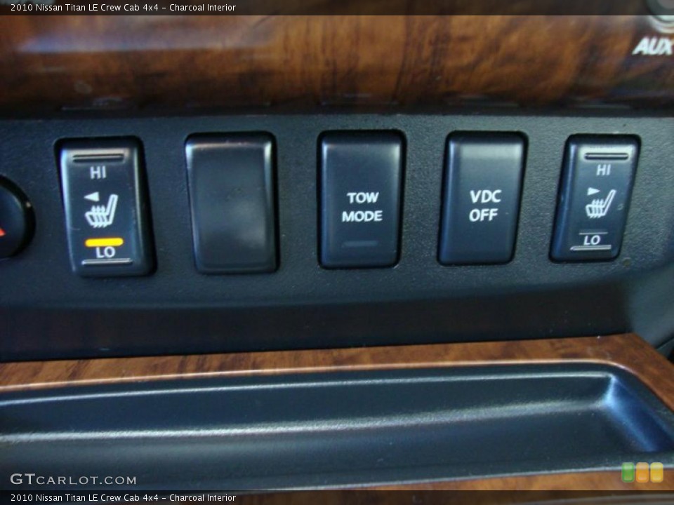 Charcoal Interior Controls for the 2010 Nissan Titan LE Crew Cab 4x4 #42754281