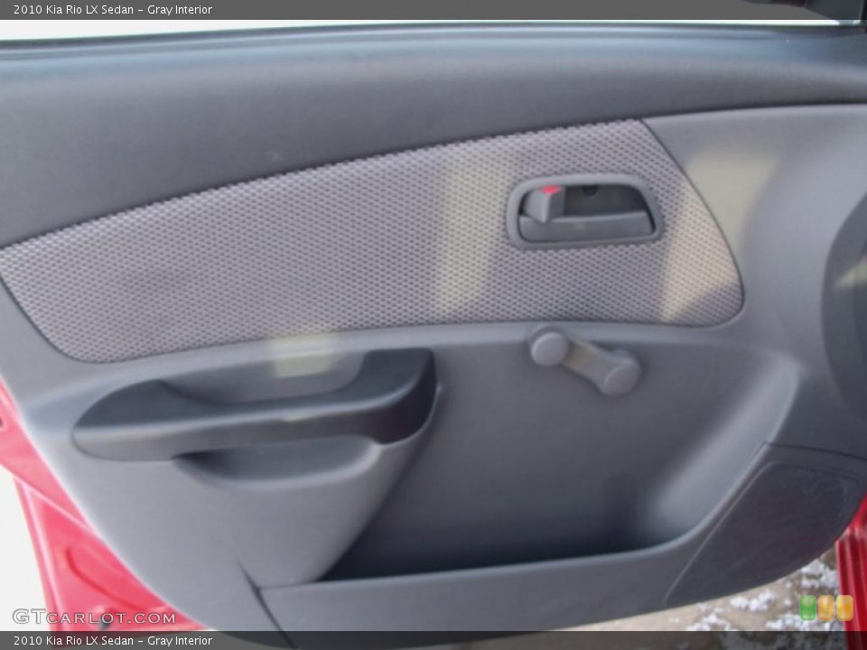 Gray Interior Door Panel for the 2010 Kia Rio LX Sedan #42760084