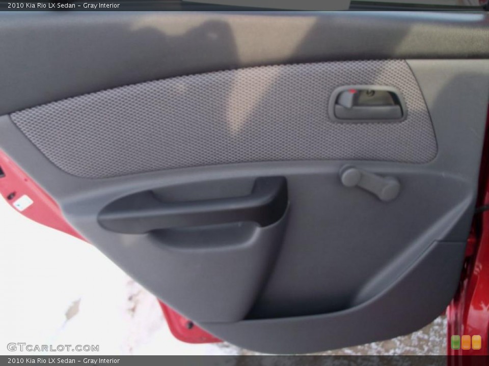 Gray Interior Door Panel for the 2010 Kia Rio LX Sedan #42760096