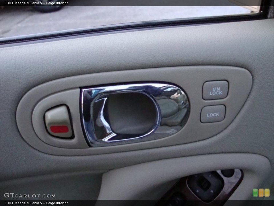 Beige Interior Controls for the 2001 Mazda Millenia S #42768592