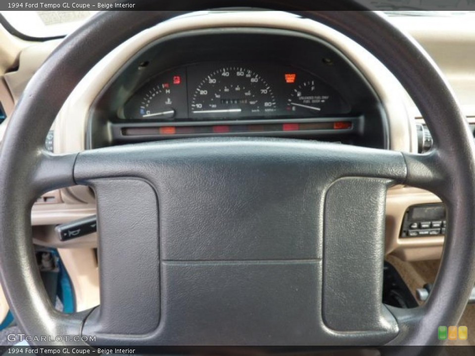Beige Interior Steering Wheel for the 1994 Ford Tempo GL Coupe #42774087