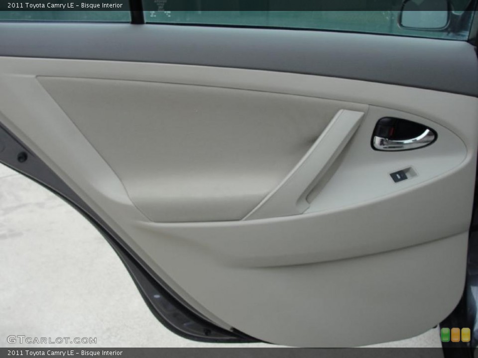 Bisque Interior Door Panel for the 2011 Toyota Camry LE #42790905
