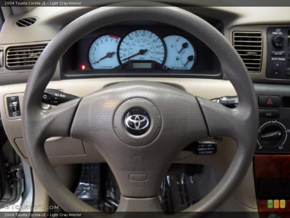 Light Gray Interior Steering Wheel for the 2004 Toyota Corolla LE #42816630