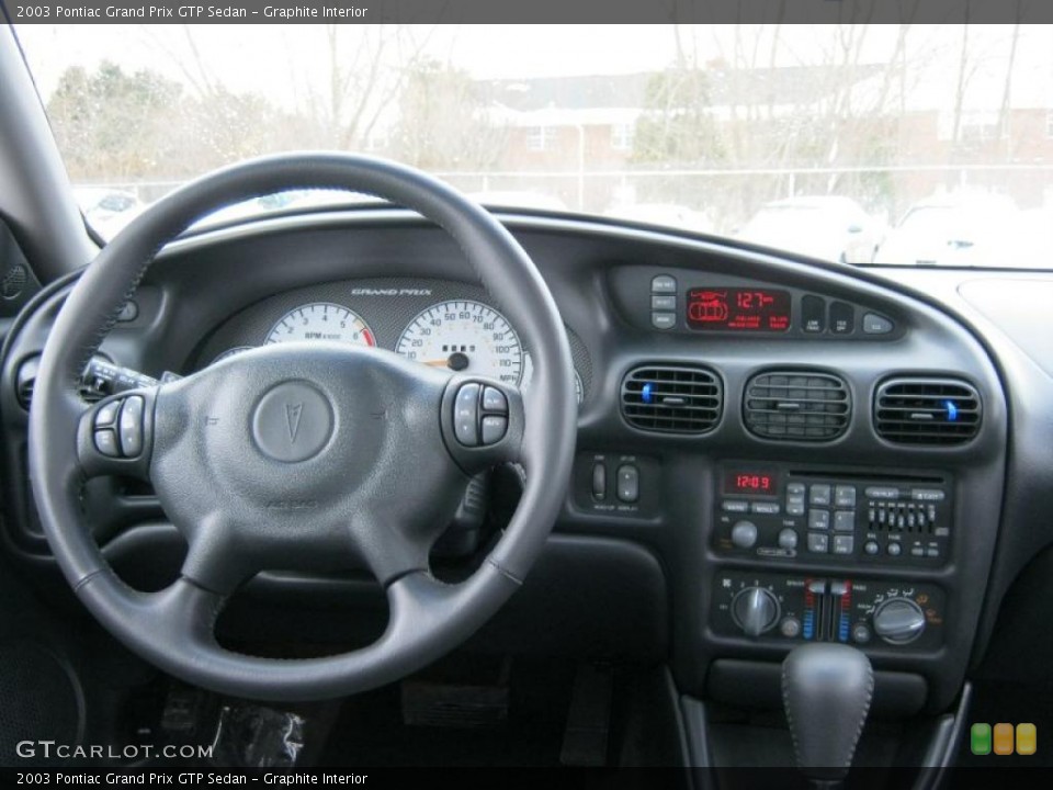 Graphite Interior Dashboard for the 2003 Pontiac Grand Prix GTP Sedan #42834966