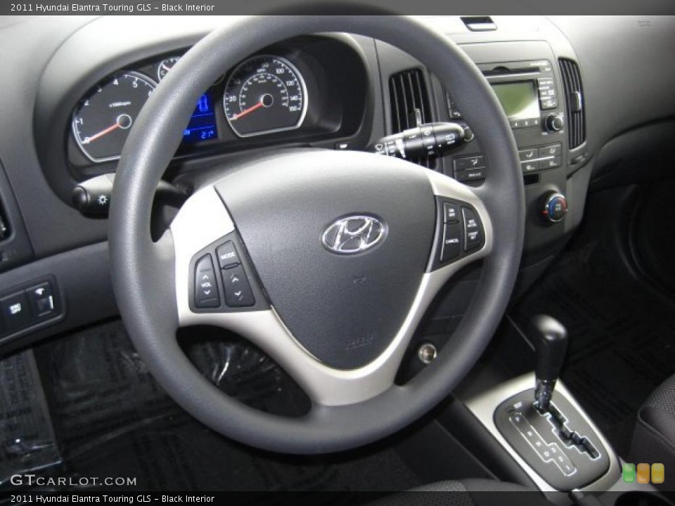 Black Interior Steering Wheel for the 2011 Hyundai Elantra Touring GLS #42906645