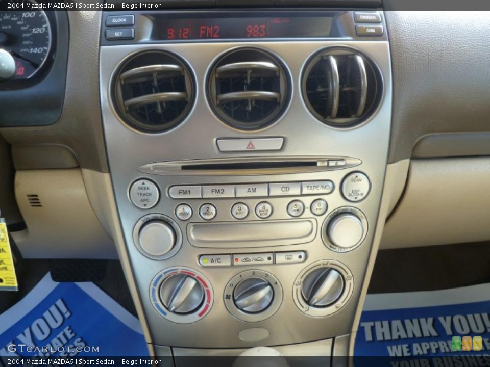 Beige Interior Controls for the 2004 Mazda MAZDA6 i Sport Sedan #42962247